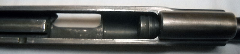 detail, Colt 1903 slide interior, showing cutout for barrel retention lugs to rotate for disassembly